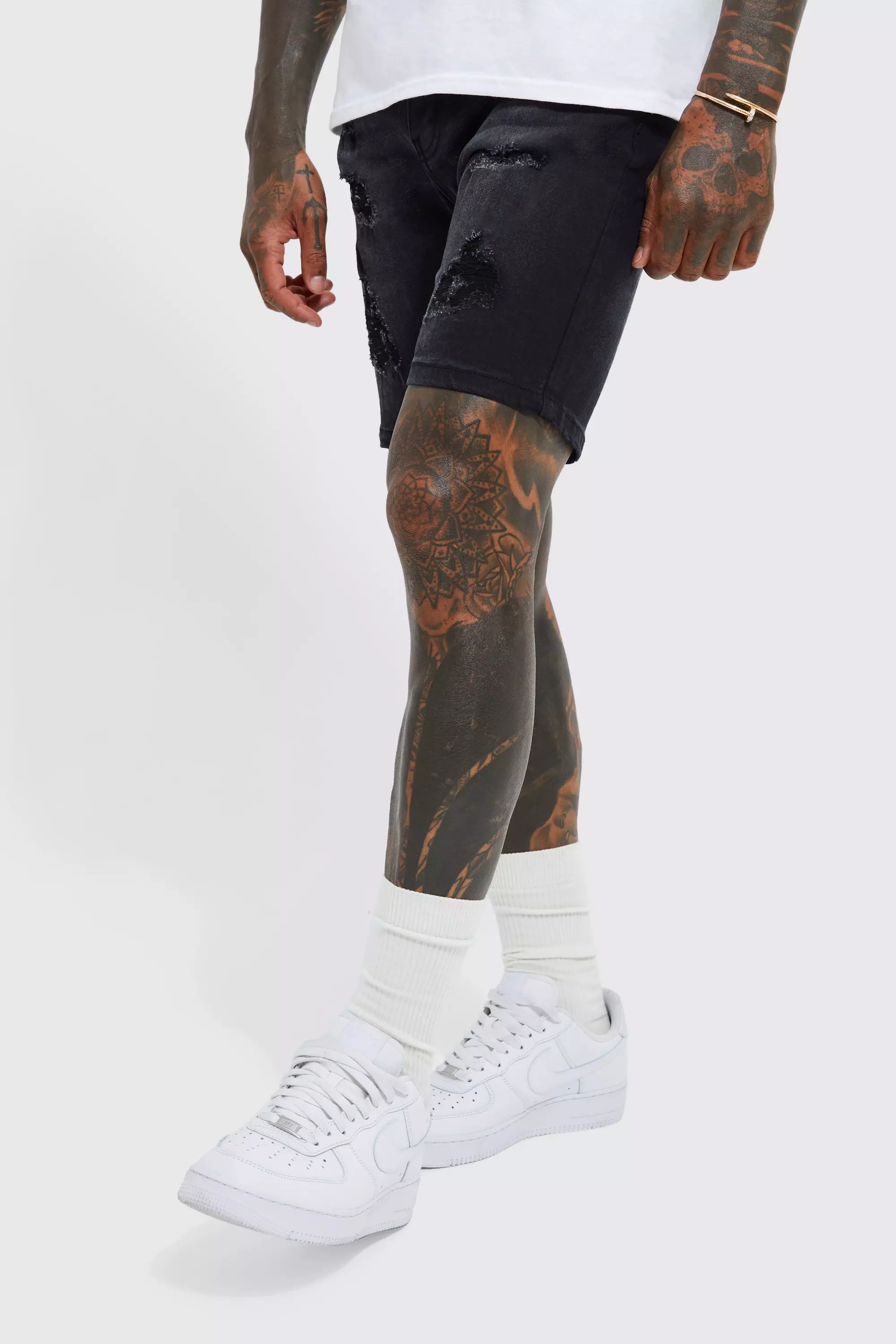 Black mens best sale ripped shorts